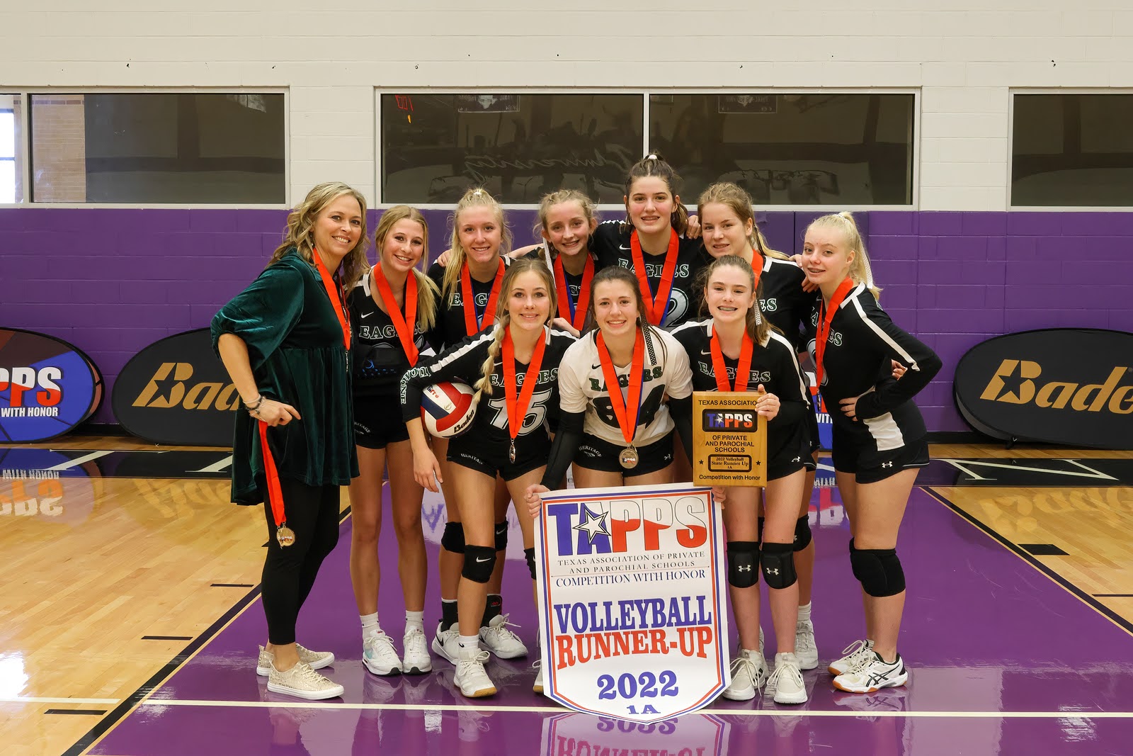 Picture of Madison and her 2022 championship volleyball team.